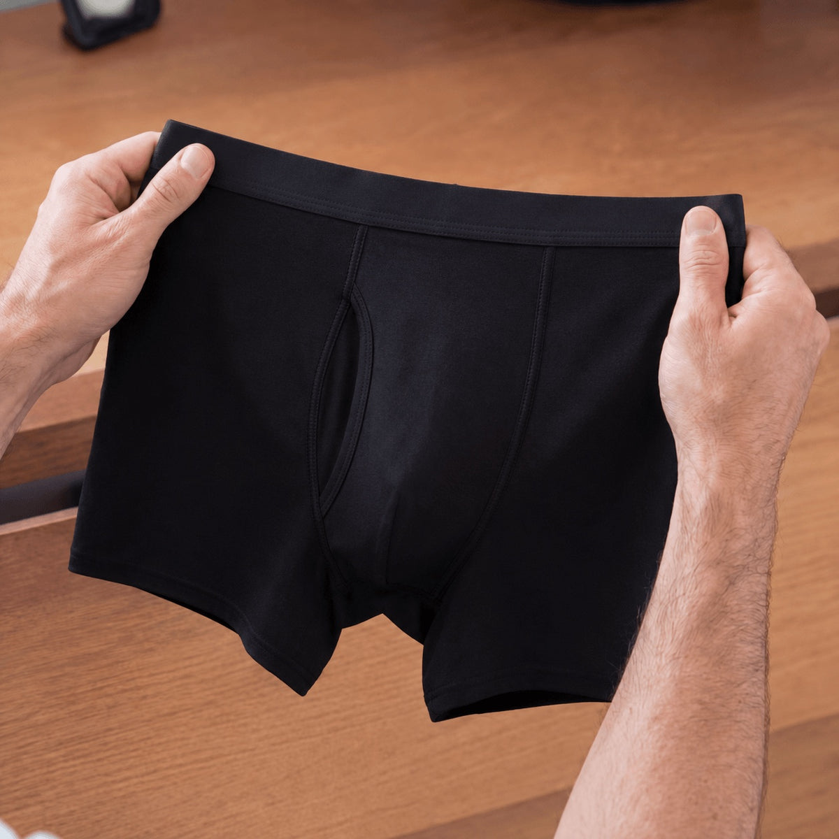 Tissu du boxer Sécurys tenu en main